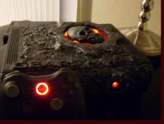 Illustration for article titled Someone's Dragon Collection Melted on this Gears of War Xbox 360